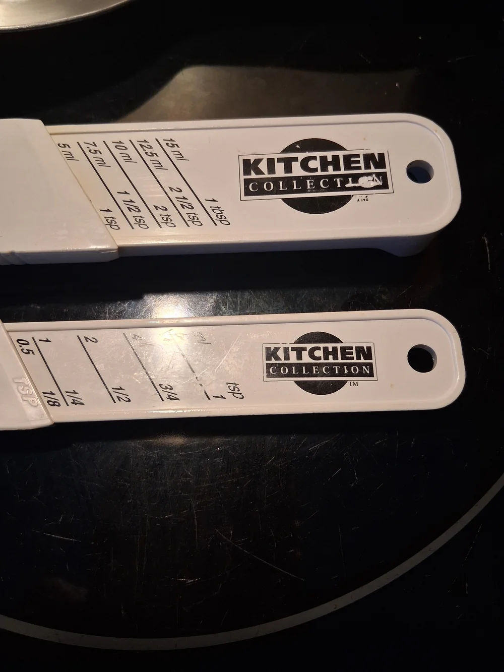 Plastic Kitchen Collection Adjustable Measuring Spoon. 1/8-1tsp &1tdp-1Tbsp.
